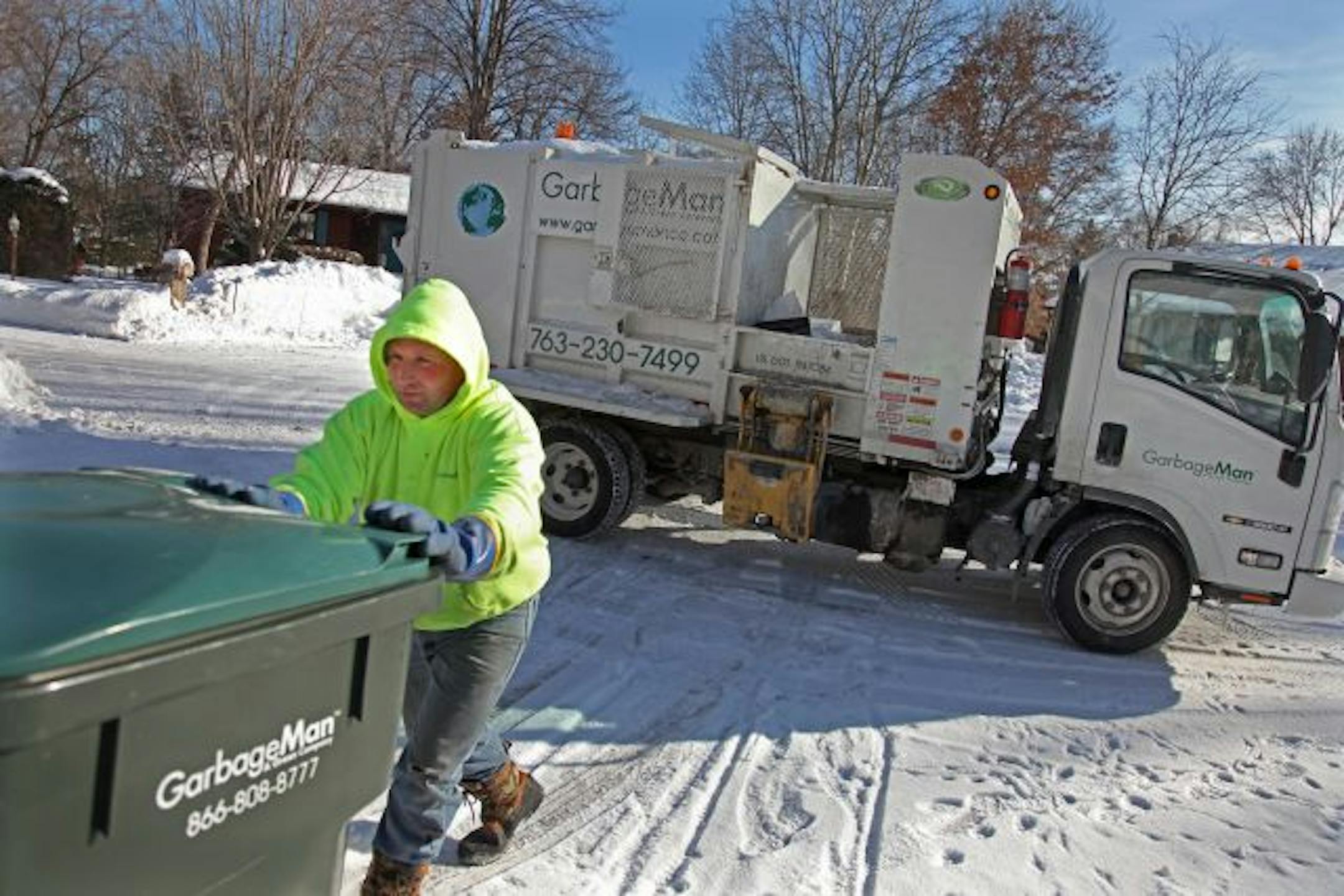 Jeff Greeder made his way through Minnetonka neighborhoods collecting garbage for Garbage Man, a environmentally friendly garbage collection company. The company uses smaller garbage trucks for their business.