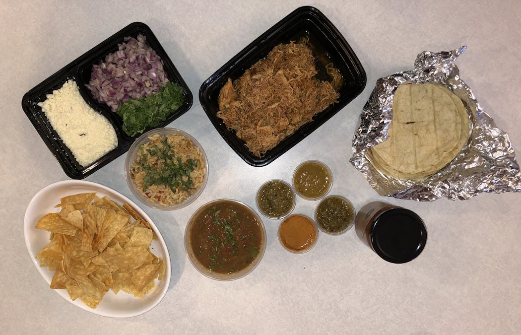 The chicken tinga family feast, served Mexican-style, from El Camino Taco Deli.
