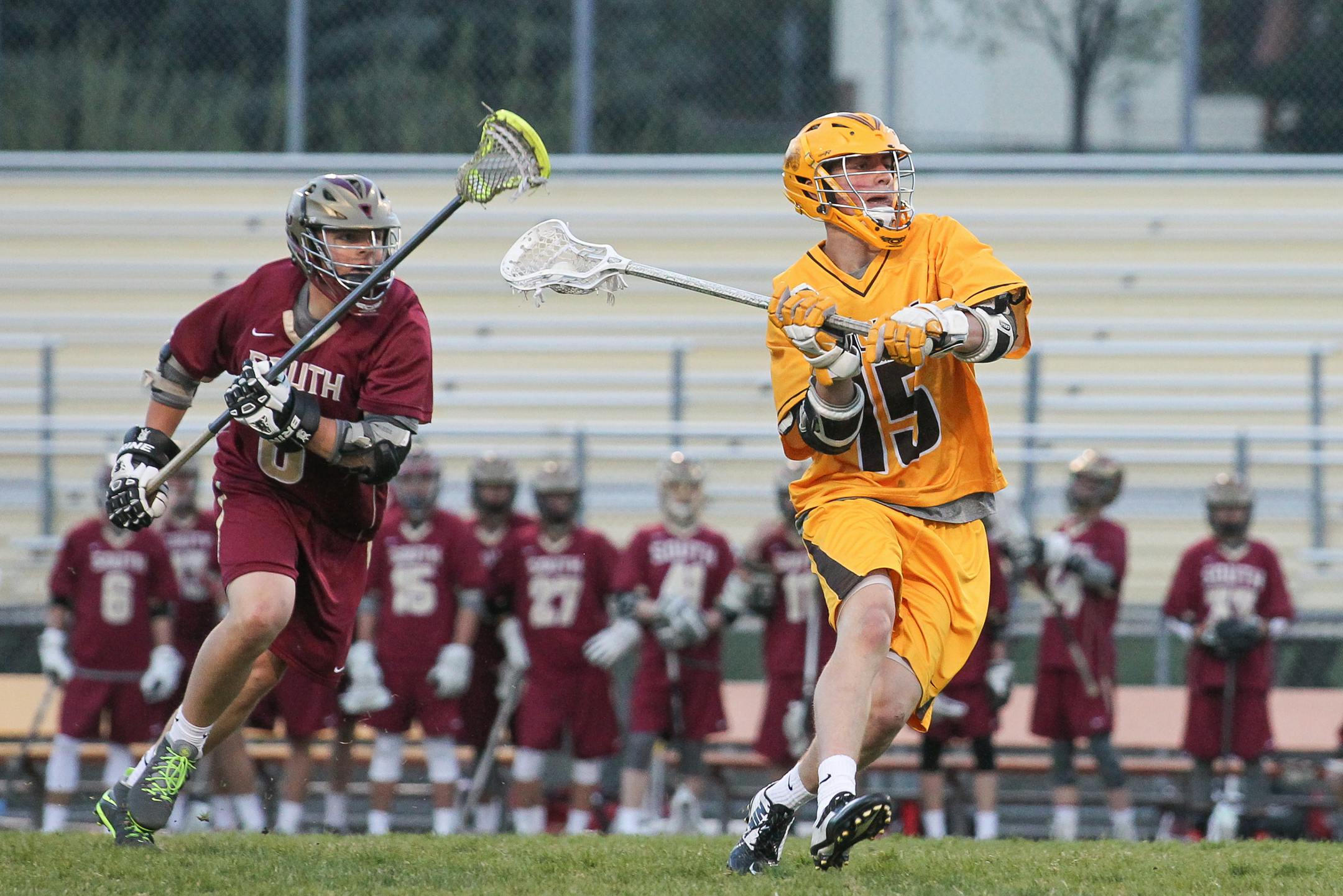 Jacob DeWall, right, is the career assists leader in boys’ lacrosse at Apple Valley.