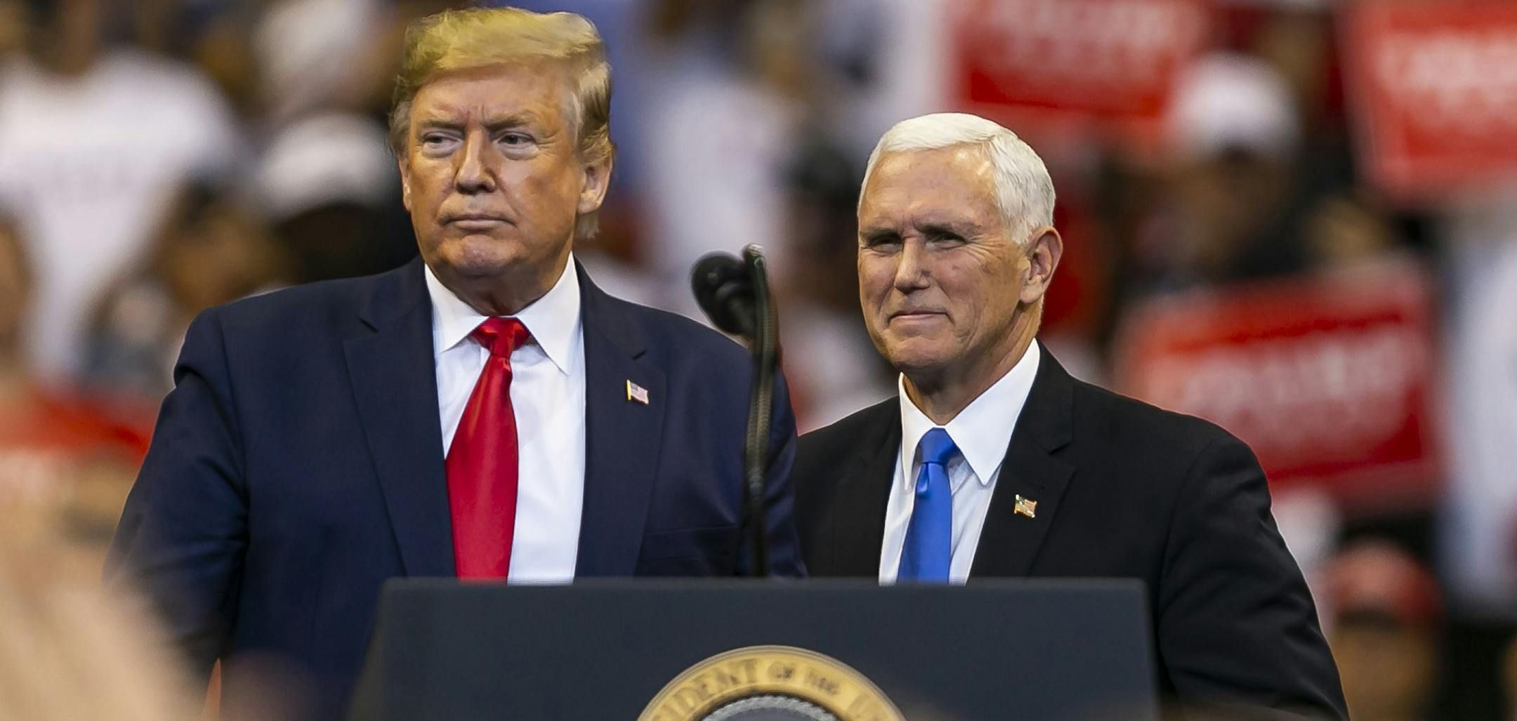 President Donald Trump, left, and Vice President Mike Pence attend a "homecoming" rally at the BBT Center in Sunrise, Fla., on Tuesday, Nov. 26, 2019. (Matias J. Ocner/Miami Herald/TNS) ORG XMIT: 1500705