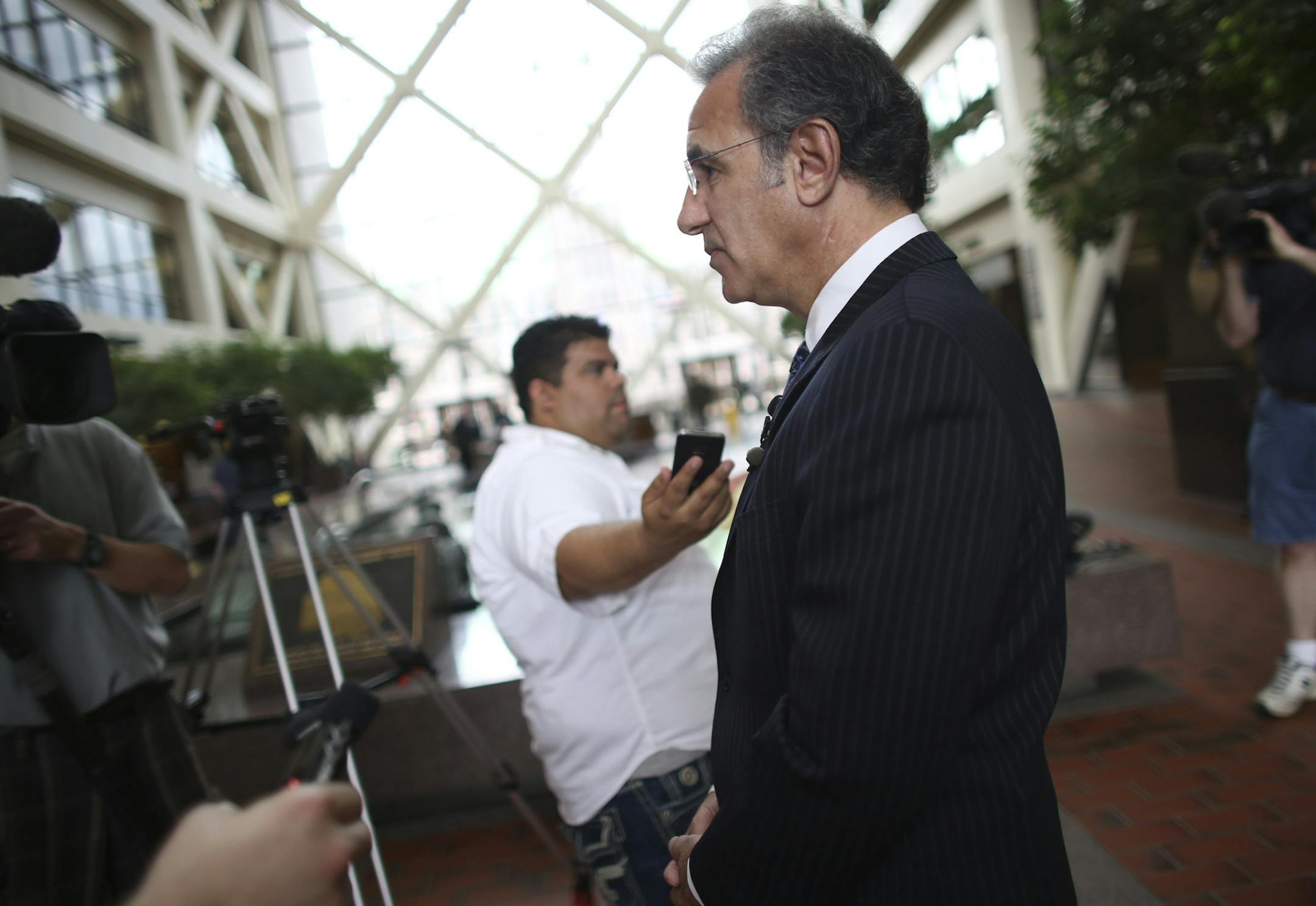 Attorney Steve Meshbesher, who represented Kao Xiong, talked about how sad the guilty verdict was for the family at the Hennepin County Government Center in Minneapolis Min., Friday, May 31, 2013. Xiong was found guilty of child endangerment after his son was accidentally shot with a loaded gun hidden in the bedroom. ] (KYNDELL HARKNESS/STAR TRIBUNE) kyndell.harkness@startribune.com Attorney Steve Meshbesher, who represented Kao Xiong, talked about how sad the guilty verdict was for the family a