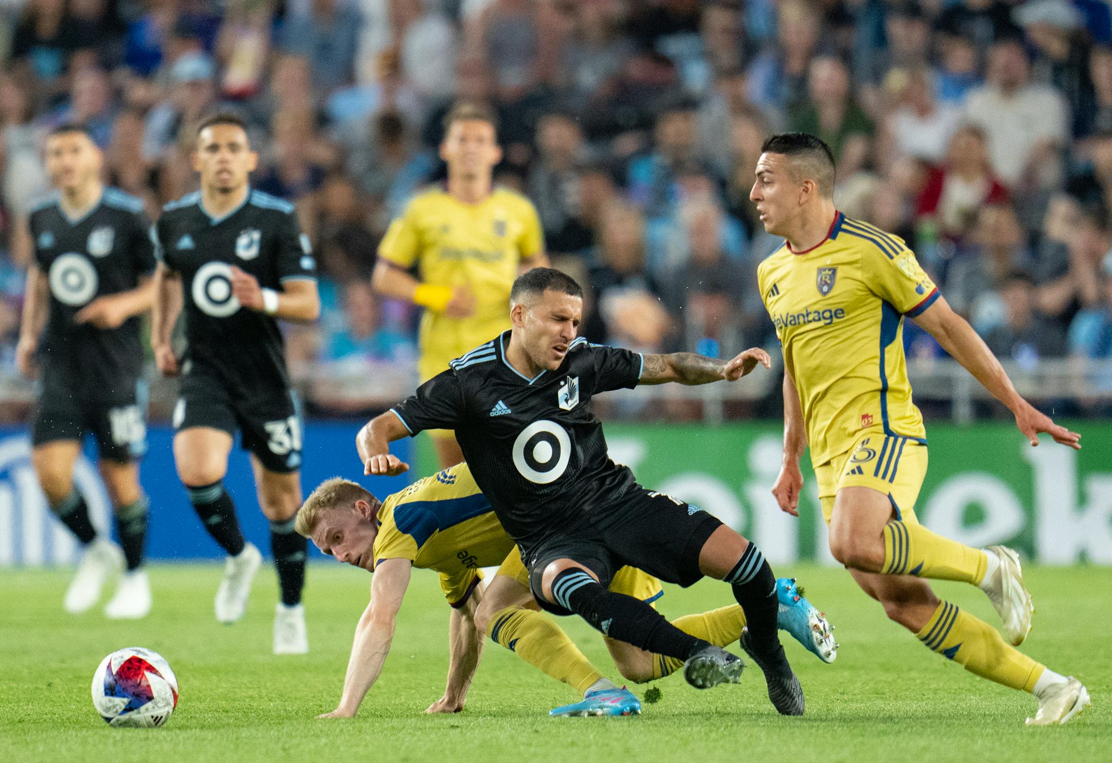 Real Salt Lake defender Jasper Löffelsend (28) fouls Minnesota United midfielder Franco Fragapane (7) in the second half.