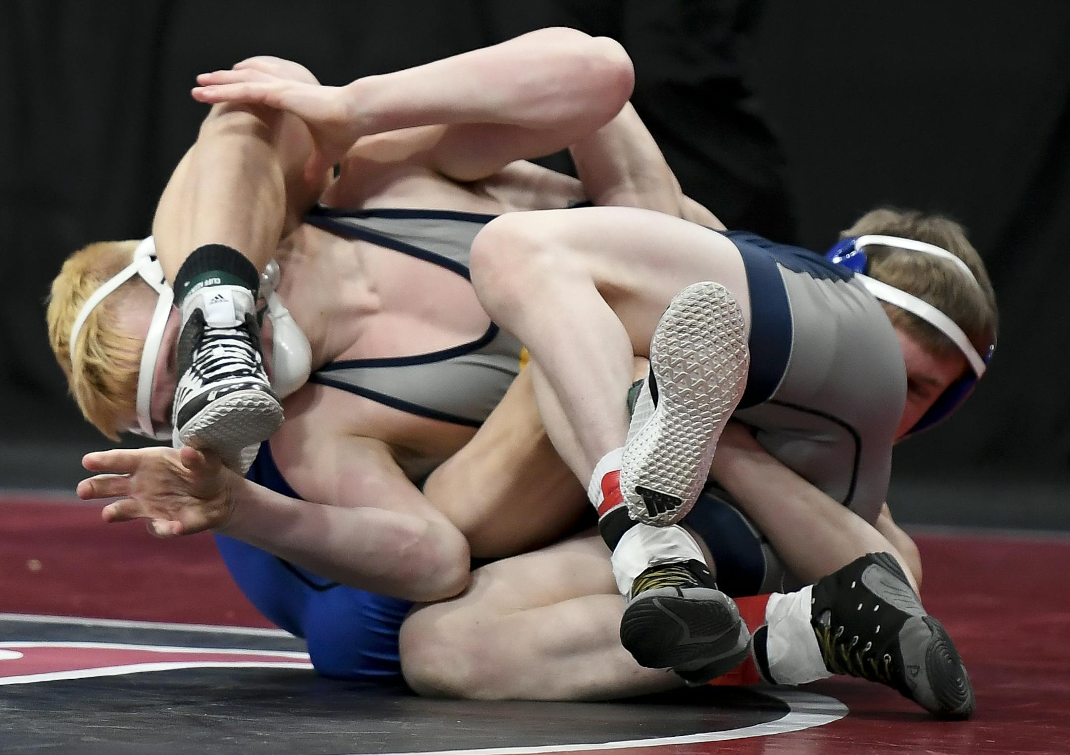 Matthew. Harfmann, from Kasson-Mantorville, wrestled Jake FitzPatrick, from Mahtomedi, during a Class 2A 132lb quarterfinal bout Friday. FitzPatrick won by decision 7-1. ] Aaron Lavinsky ¥ aaron.lavinsky@startribune.com The Class 3A, 2A and 1A wrestling state meet quarterfinals were held Friday, March 1, 2019 at the Xcel Energy Center in St. Paul. Minn.