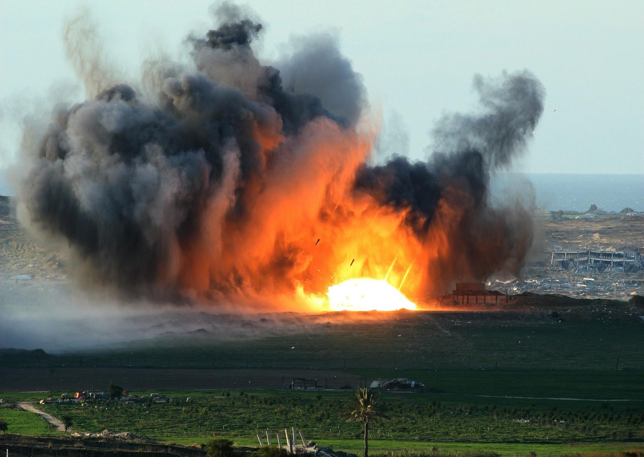 An explosion is seen as missiles fired from an Israeli aircraft fly towards a target in the northern Gaza Strip, as seen from the Israeli side of the border, Thursday, Jan. 1, 2009. More than 400 Gazans have been killed and some 1,700 have been wounded since Israel embarked on its aerial campaign on Saturday, Gaza health officials said. The U.N. says the Gaza death toll includes more than 60 civilians, 34 of them children. Three Israeli civilians and one soldier have also died in rocket attacks
