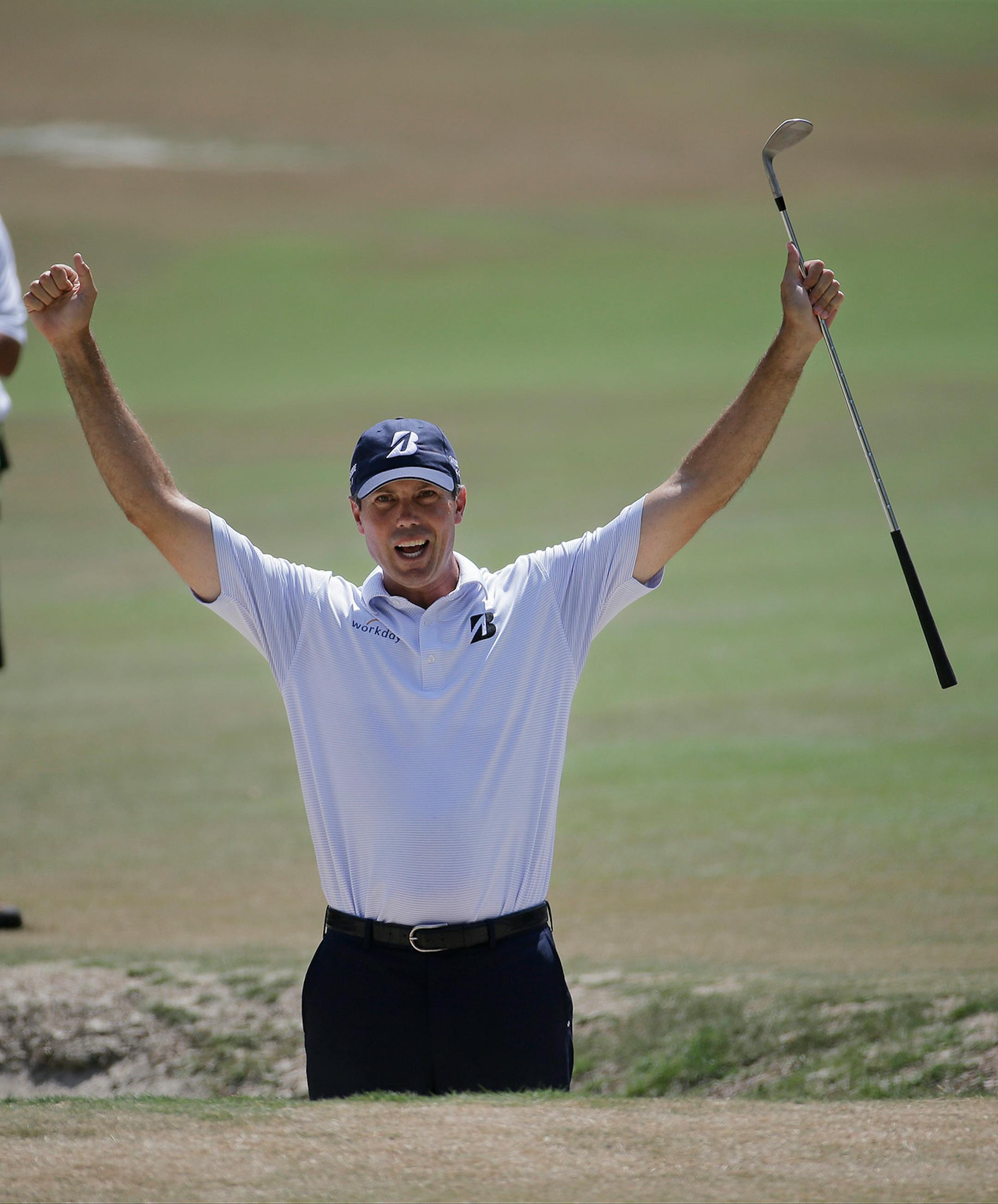 Matt Kuchar holes out from the bunker on the fourth hole during the third round of the U.S. Open golf tournament in Pinehurst, N.C., Saturday, June 14, 2014.