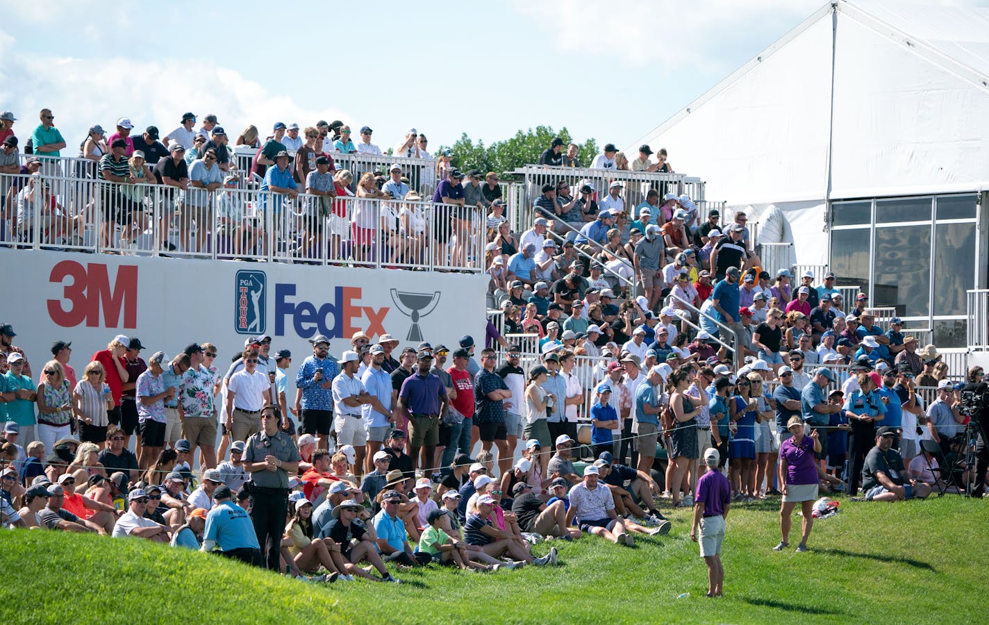 A large gallery watched action on the 18th hole during the final day of last year's 3M Open at the Tournament Players Club in Blaine.