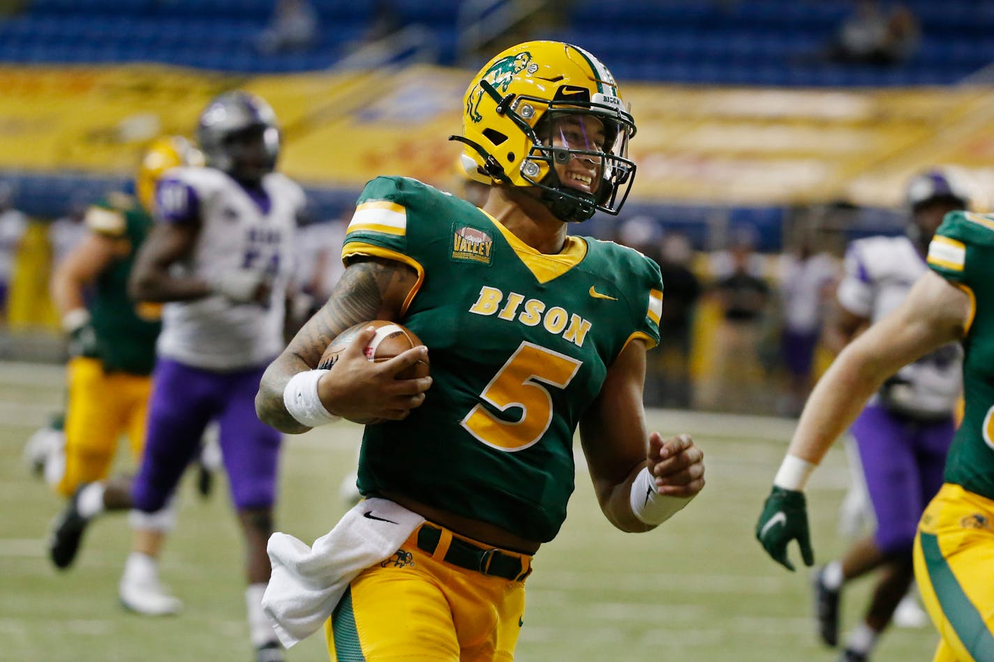 North Dakota State quarterback Trey Lance runs for a touchdown against Central Arkansas in the third quarter of an NCAA college football game Saturday, Oct. 3, 2020, in Fargo, N.D. North Dakota State won 39-28. (AP Photo/Bruce Kluckhohn)