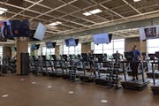 People worked out on treadmills at Life Time’s fitness center in Edina’s Southdale Center.