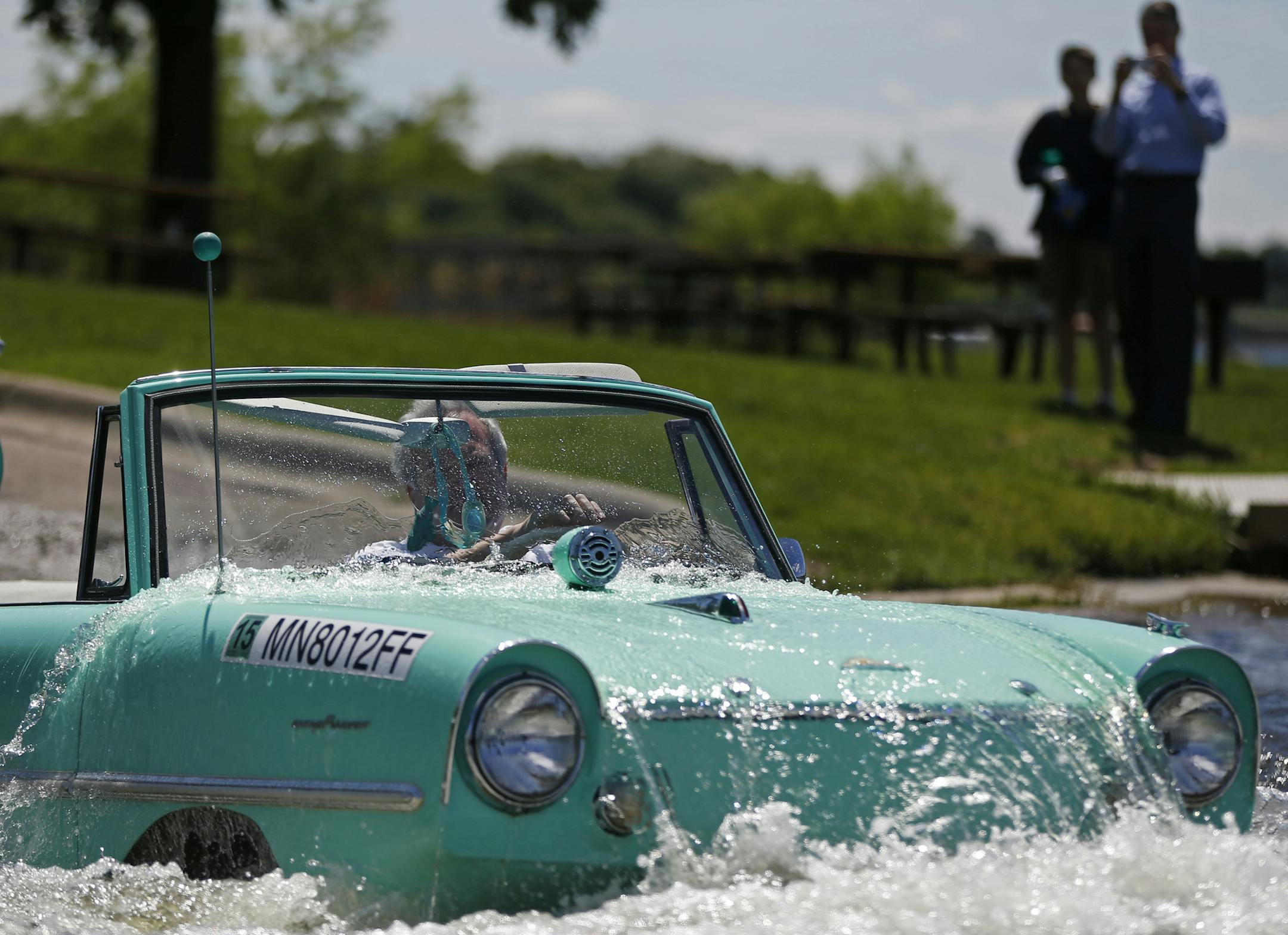 At Bryant Lake in Eden Prairie, Rich Rosenberg loves his Amphicar this shade of green. They are all convertibles, of course. ] richard tsong-taatarii@startribune.com