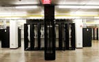 A server room in a new data center, Intergate.Manhattan, is shown in New York, Wednesday, March 20, 2013. The 32-story Intergate.Manhattan, once a Ver