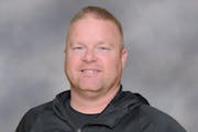 Adam Spurrell, the new head football coach at Maple Grove, has been an assistant for the Crimson for 19 years.