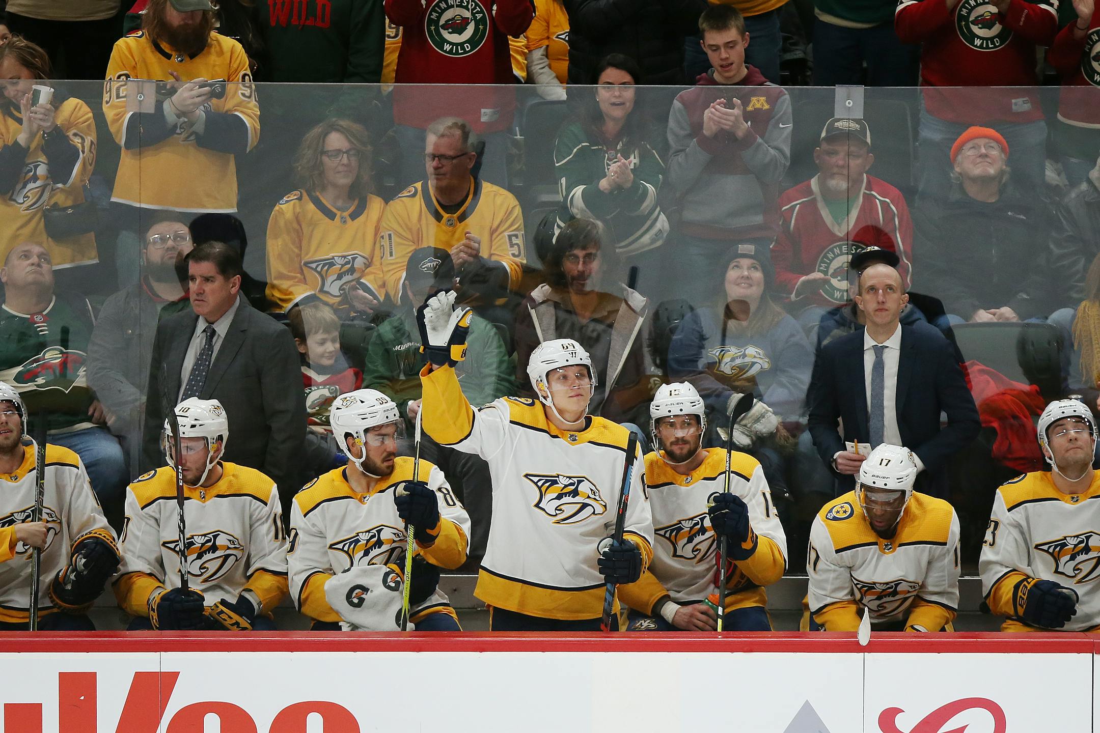 Mikael Granlund waves to fans after returning to the ice to play against his former team the Wild on Sunday.