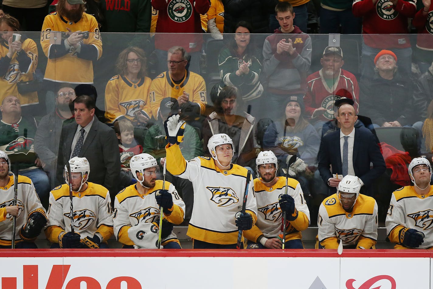 Mikael Granlund waves to fans after returning to the ice to play against his former team the Wild on Sunday.