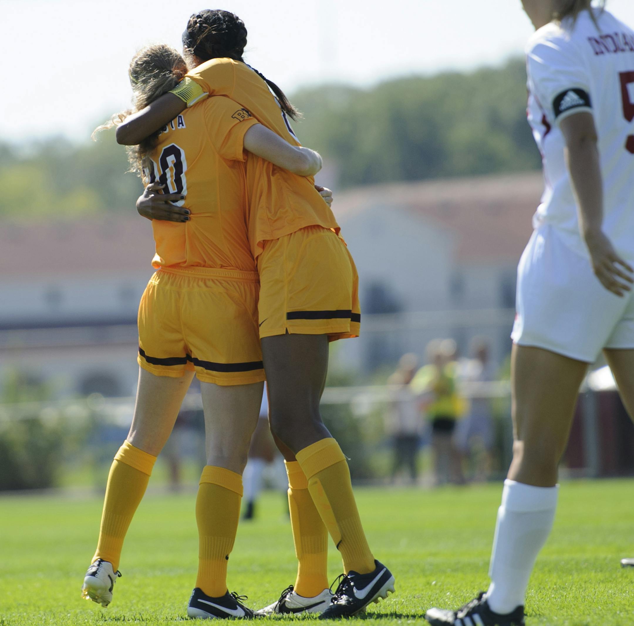 Freshman April Bockin, left, and junior Simone Kolander celebrated a Gophers goal — a familiar sight this season. Kolander has 10 goals and Bockin two, plus four assists.