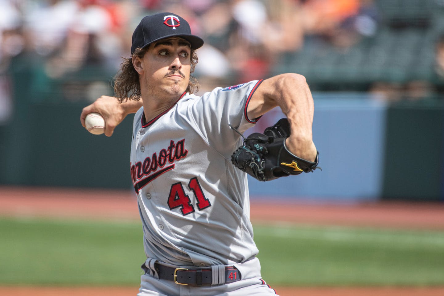 Minnesota Twins starting pitcher Joe Ryan delivers against the Cleveland Guardians during the first inning of a baseball game in Cleveland, Sunday, Sept. 18, 2022. (AP Photo/Phil Long)