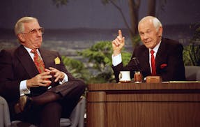 ** FILE ** Talk show host Johnny Carson, right, is shown with the show's announcer Ed McMahon during the final taping of the "Tonight Show" in Burbank