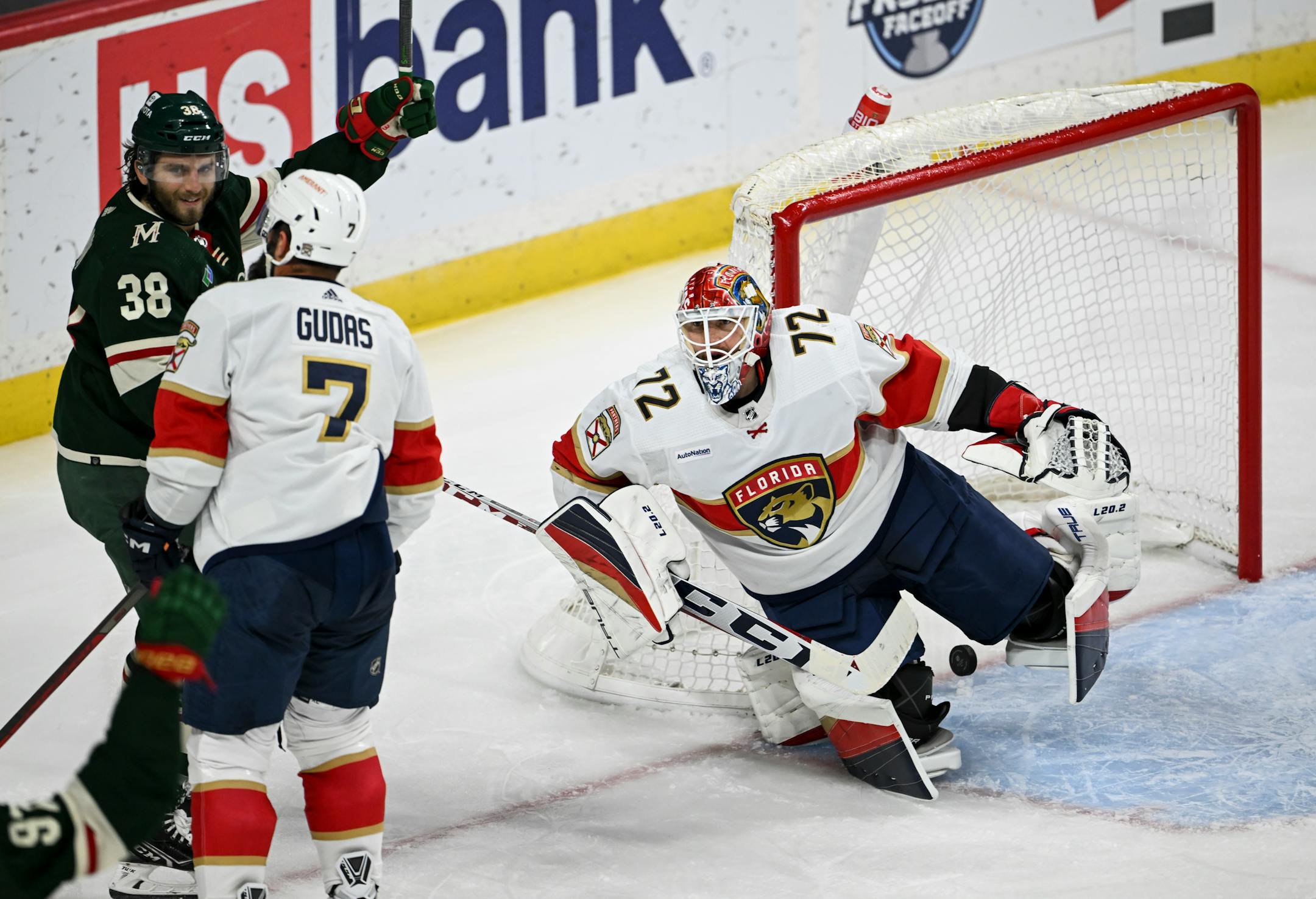 Minnesota Wild right wing Ryan Hartman (38) celebratres a goal by left wing Kirill Kaprizov (97) against Florida Panthers goaltender Sergei Bobrovsky (72) during the second period.