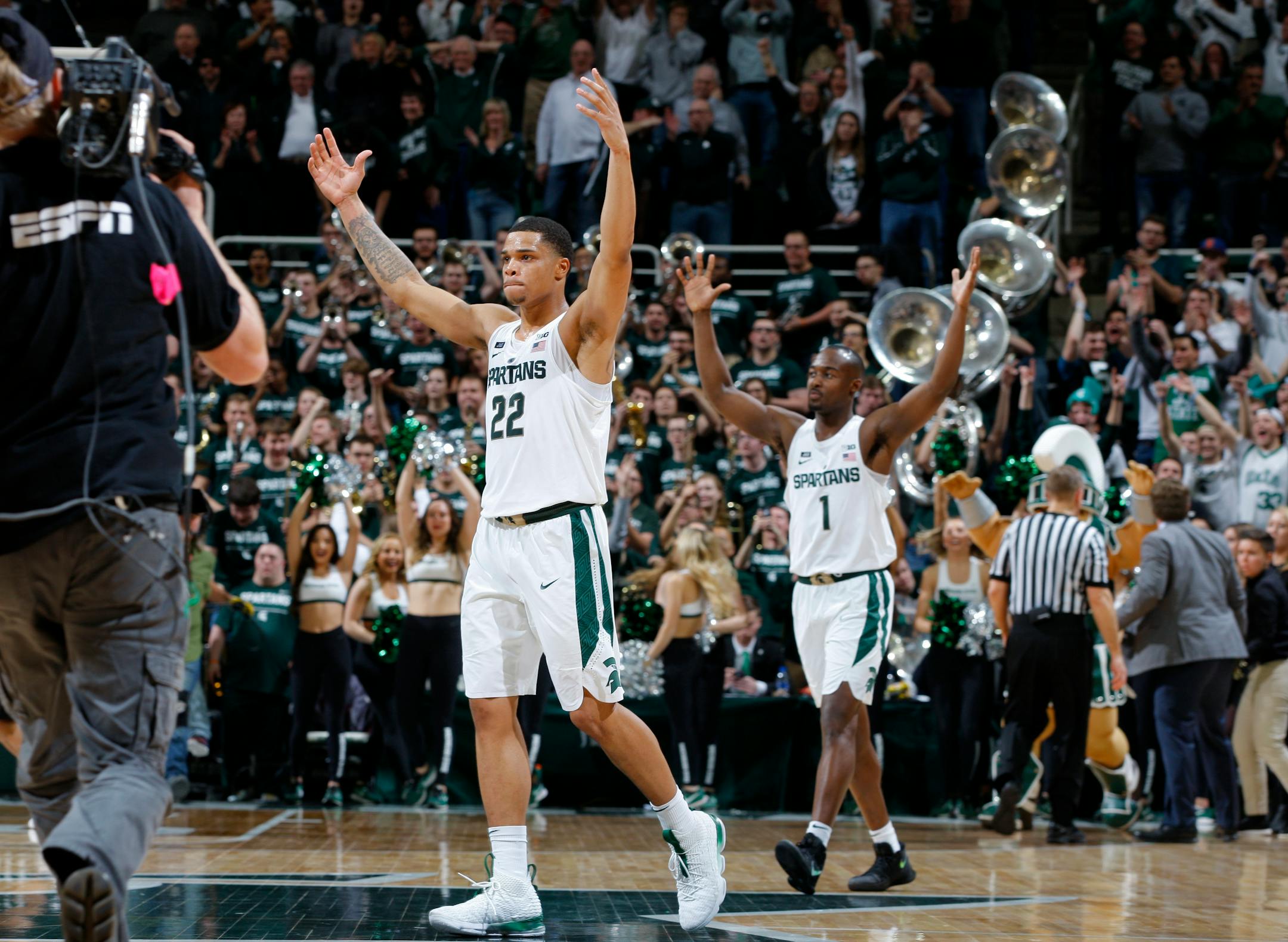 Michigan State's Miles Bridges (22) and Joshua Langford (1) celebrate following a 68-65 win over Purdue in an NCAA college basketball game, Saturday, Feb. 10, 2018, in East Lansing, Mich. (AP Photo/Al Goldis)