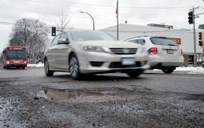 There’s a proposal on St. Paul ballots this fall: a 1% sales tax for the next 20 years, dedicated to street and park improvements. Above, drivers d