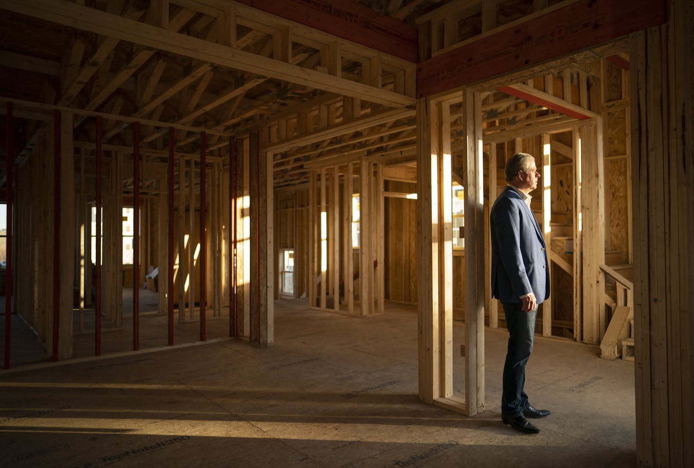 Realtor Jim Schwarz in one of the townhomes under construction in his Sheldon Place development in Eden Prairie in December.