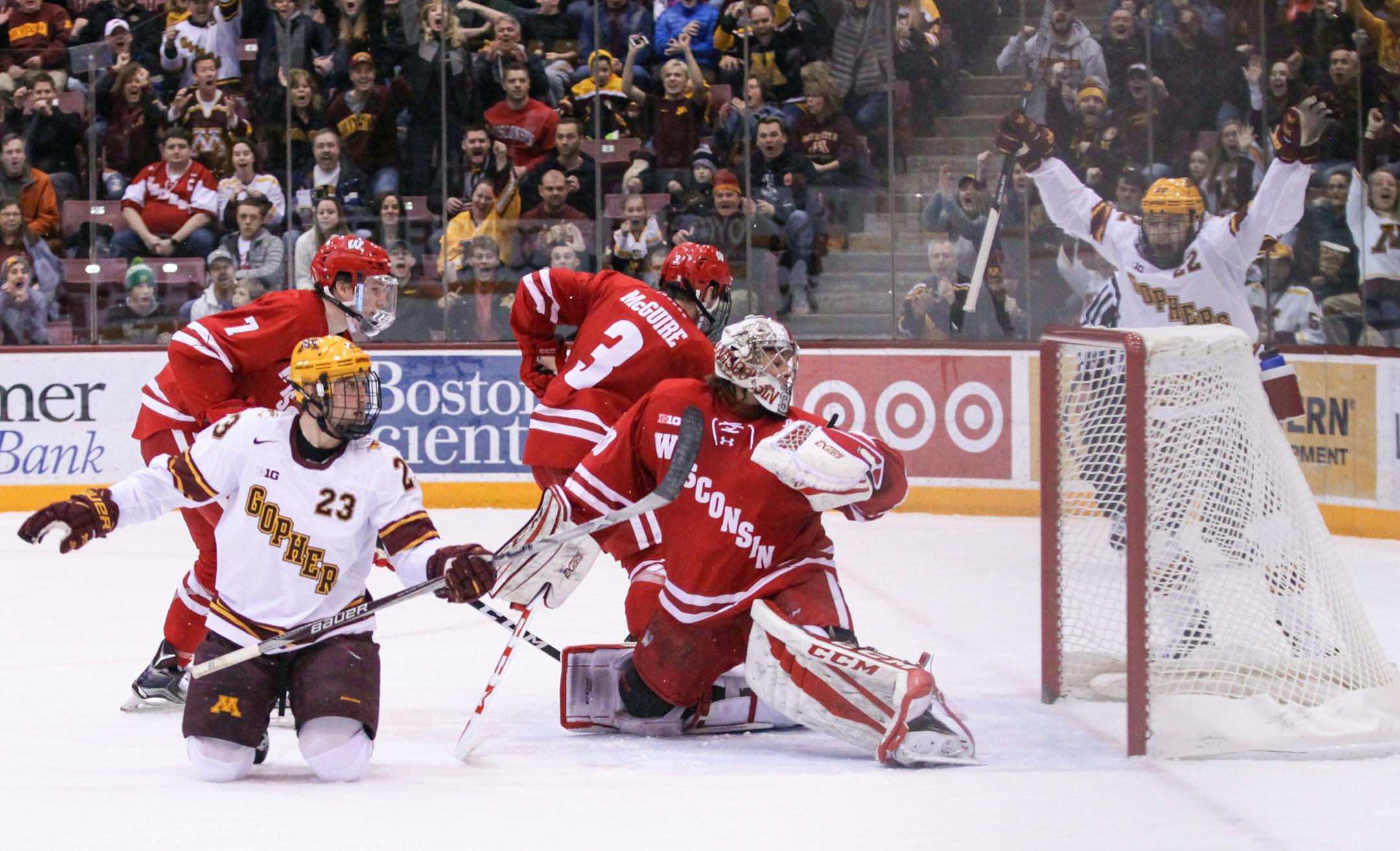 Ryan Norman (23) looked for the puck after he scored in the last 2 minutes of the first period.