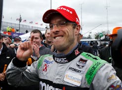 Sebastien Bourdais celebrated winning the second race of the IndyCar Detroit Grand Prix auto racing doubleheader on Sunday.
