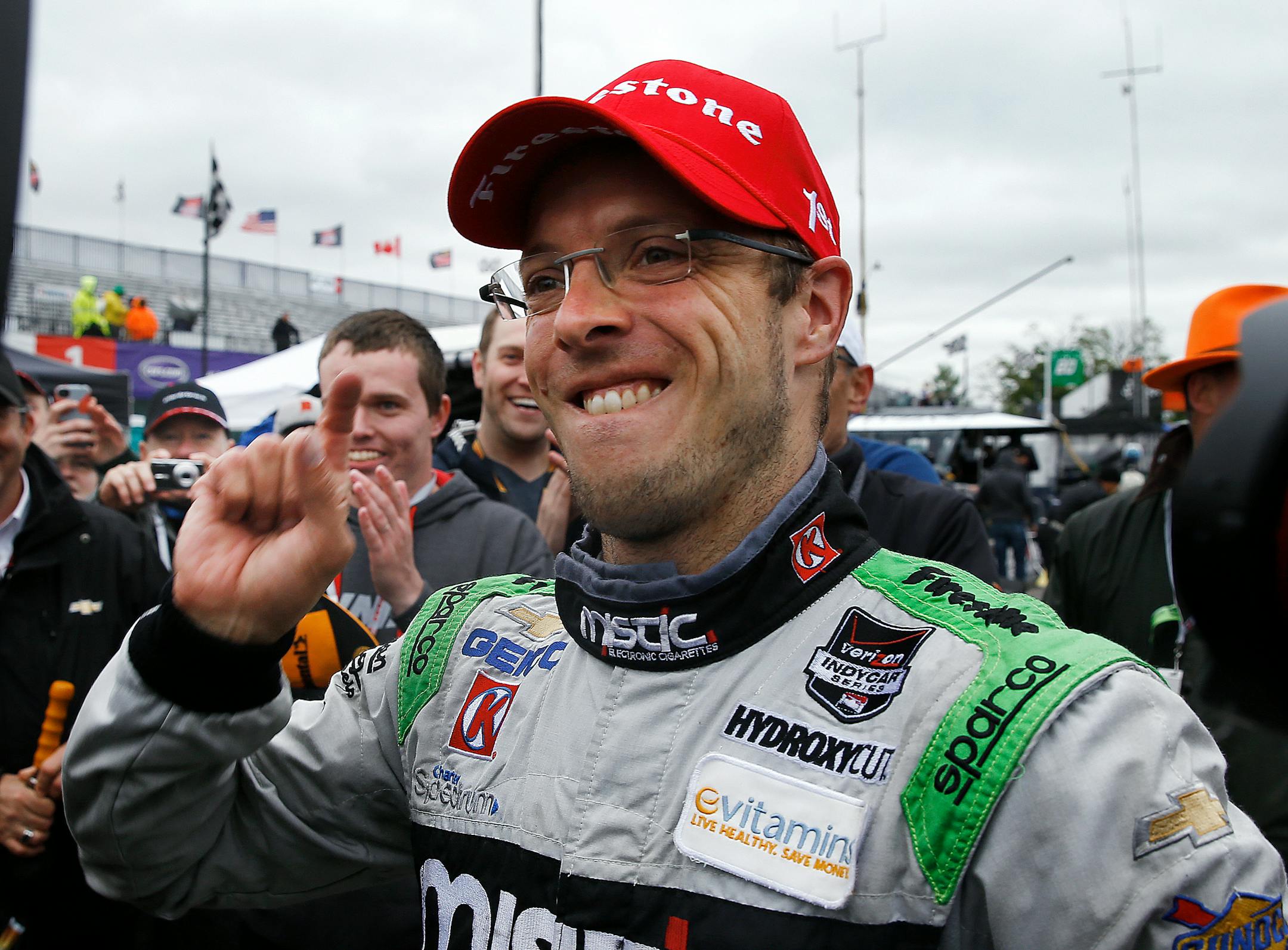 Sebastien Bourdais celebrated winning the second race of the IndyCar Detroit Grand Prix auto racing doubleheader on Sunday.