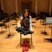Moldovan violinist Patricia Kopatchinskaja, who preferred playing with her shoes off sat in the practice space for the St. Paul Chamber Orchestra.