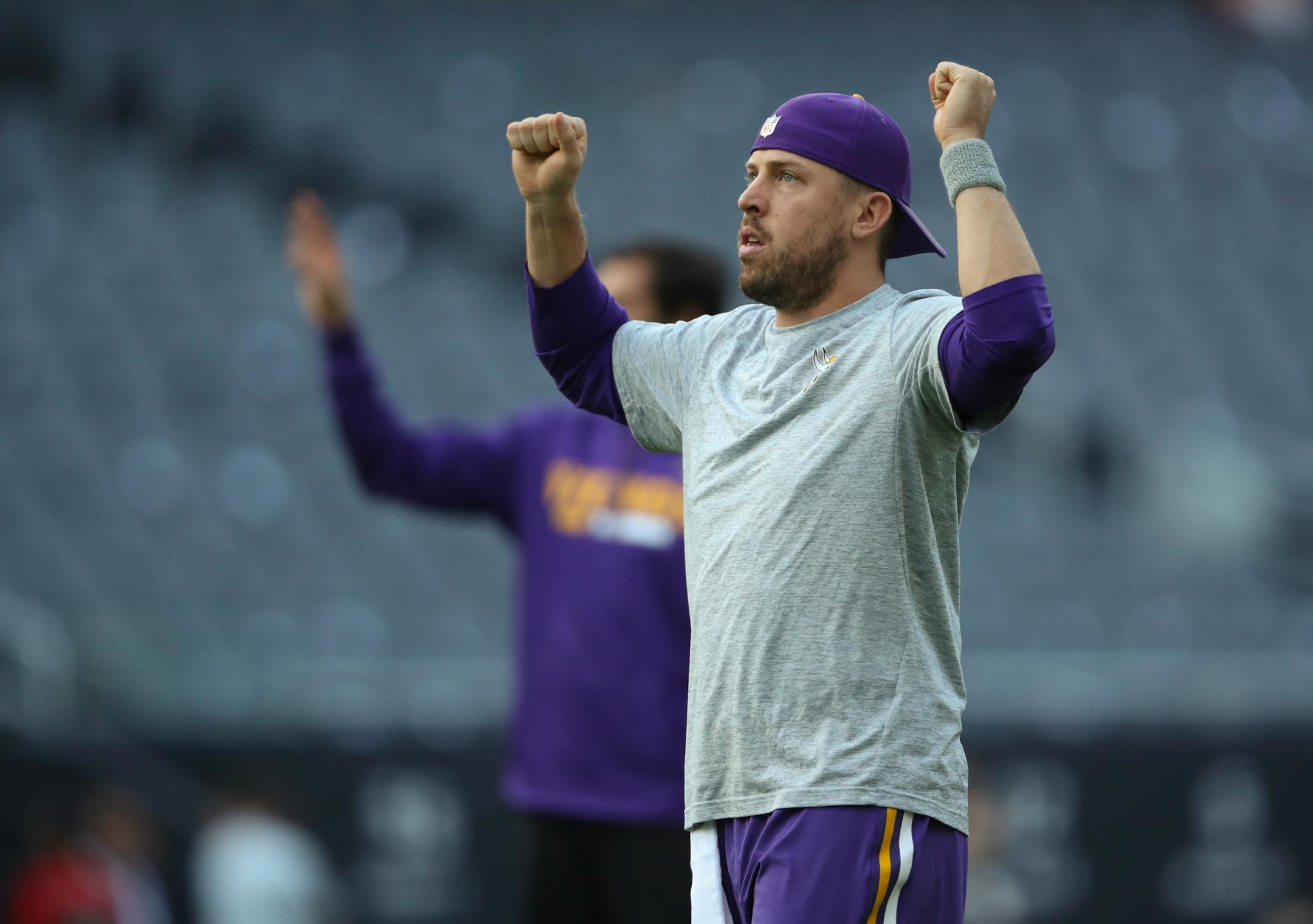 Minnesota Vikings quarterback Case Keenum stretched during early warmups on the field in Chicago Monday evening.