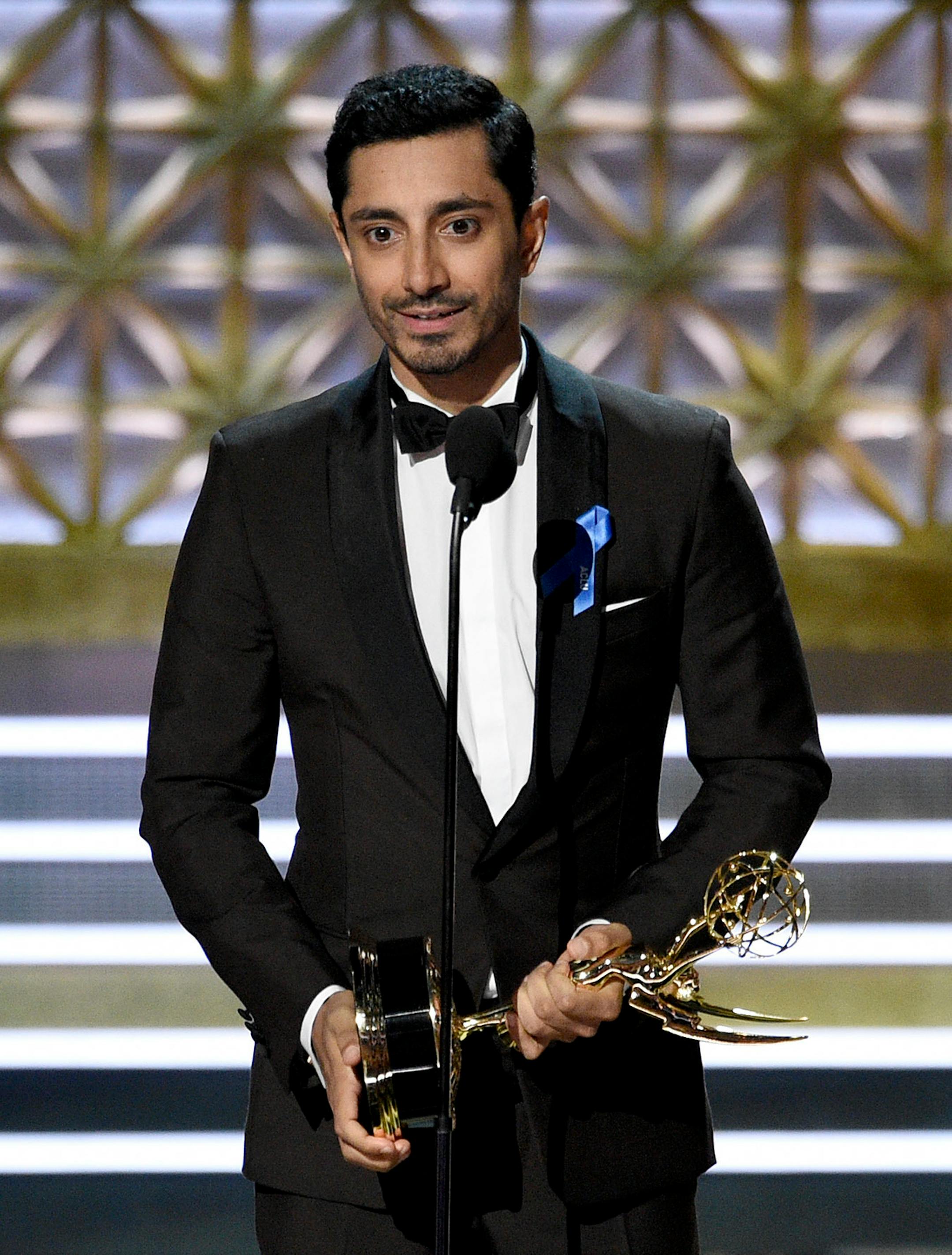 Riz Ahmed accepts the award for outstanding lead actor in a limited series or a movie for "The Night Of" at the 69th Primetime Emmy Awards on Sunday, Sept. 17, 2017, at the Microsoft Theater in Los Angeles.