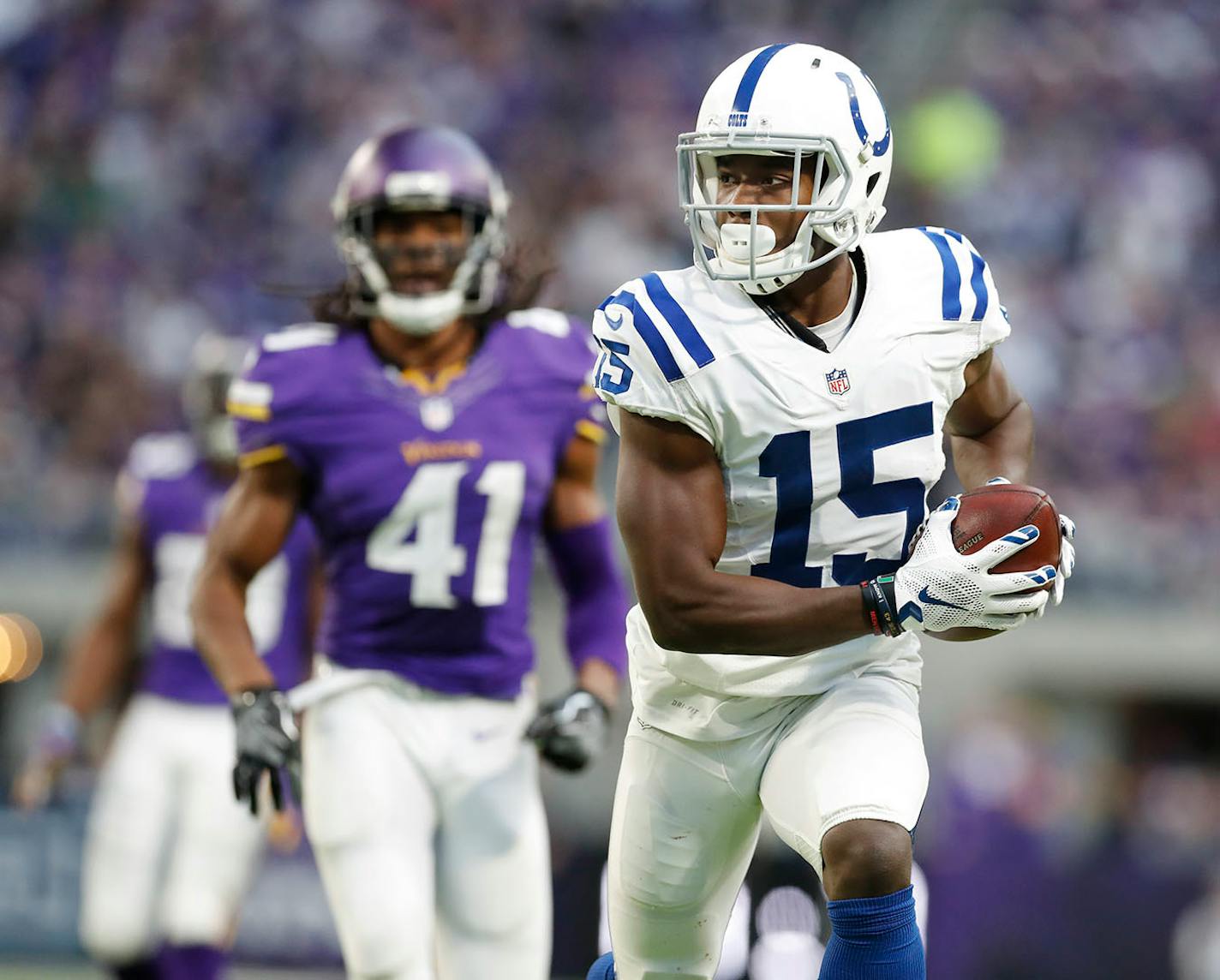 Indianapolis Colts wide receiver Phillip Dorsett (15) scored on a 50 yard touchdown reception over Minnesota Vikings free safety Anthony Harris (41) in the fourth quarter at U.S. Bank Stadium Sunday December 18,2016 in Minneapolis, MN.