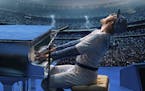 This image released by Paramount Pictures shows Taron Egerton as Elton John in a scene from "Rocketman." (David Appleby/ Paramount Pictures via AP)