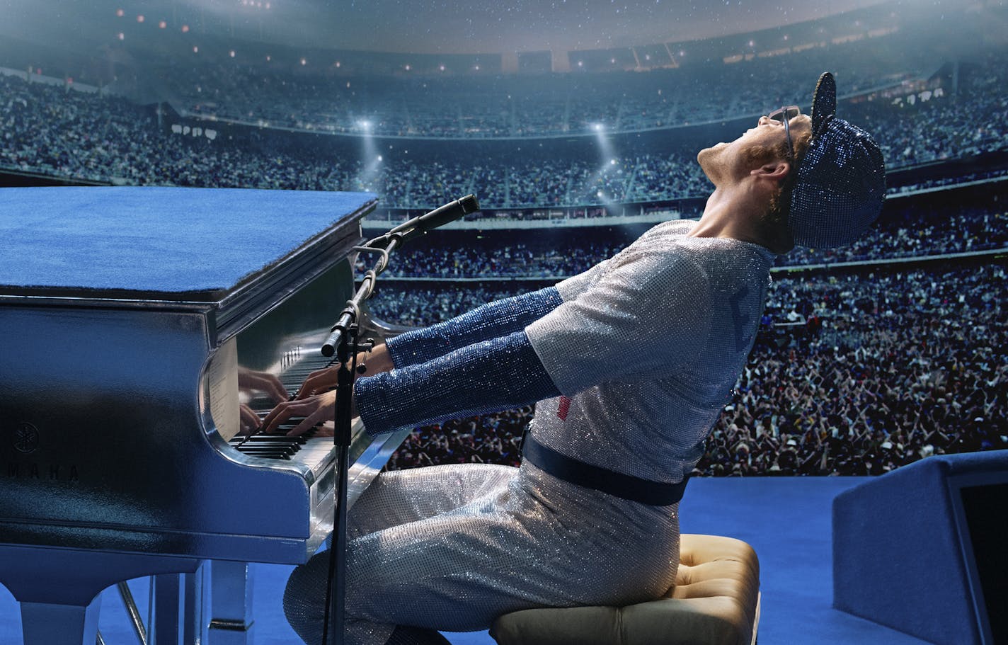 This image released by Paramount Pictures shows Taron Egerton as Elton John in a scene from "Rocketman." (David Appleby/ Paramount Pictures via AP)