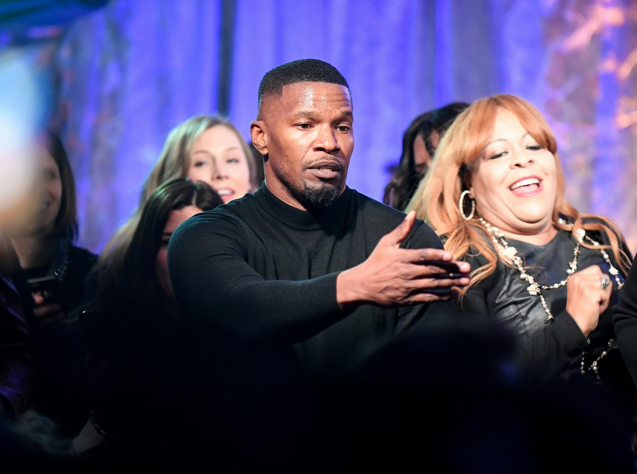 Jamie Foxx sang "Gold Digger" while emceeing Saturday night's "Big Game Big Give" charity party in Edina.
