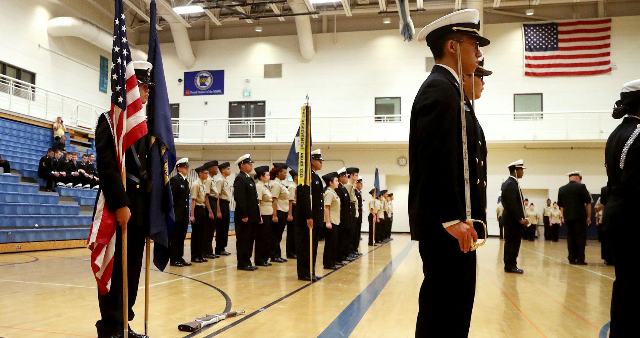 Washington Technology Magnet School Navy junior ROTC Honor Guard member James Vo, a junior, rear left, holds two flags as fellow Honor Guard members received medals during an inspection and review Thursday, Oct. 27, 2016, at Washington in St. Paul, MN.](DAVID JOLES/STARTRIBUNE)djoles@startribune.com The St. Paul school district is considering expanding its school ROTC programs to a sixth high school -- Highland Park Senior High -- in 2017-18. On Thursday night, the school will seek input on the