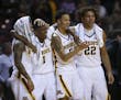Gophers Nate Mason, Dupree McBrayer, Amir Coffey, and Reggie Lynch celebrated dominating the Bulldogs as time ran out Tuesday night.