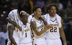 Gophers Nate Mason, Dupree McBrayer, Amir Coffey, and Reggie Lynch celebrated dominating the Bulldogs as time ran out Tuesday night.