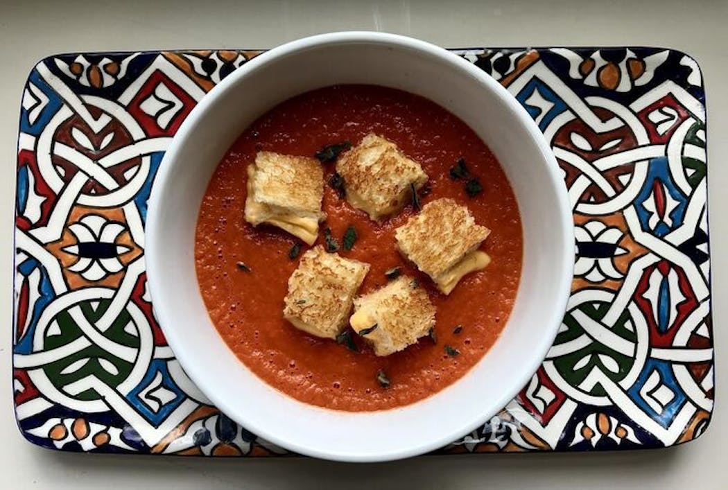 Tomato soup with grilled cheese croutons