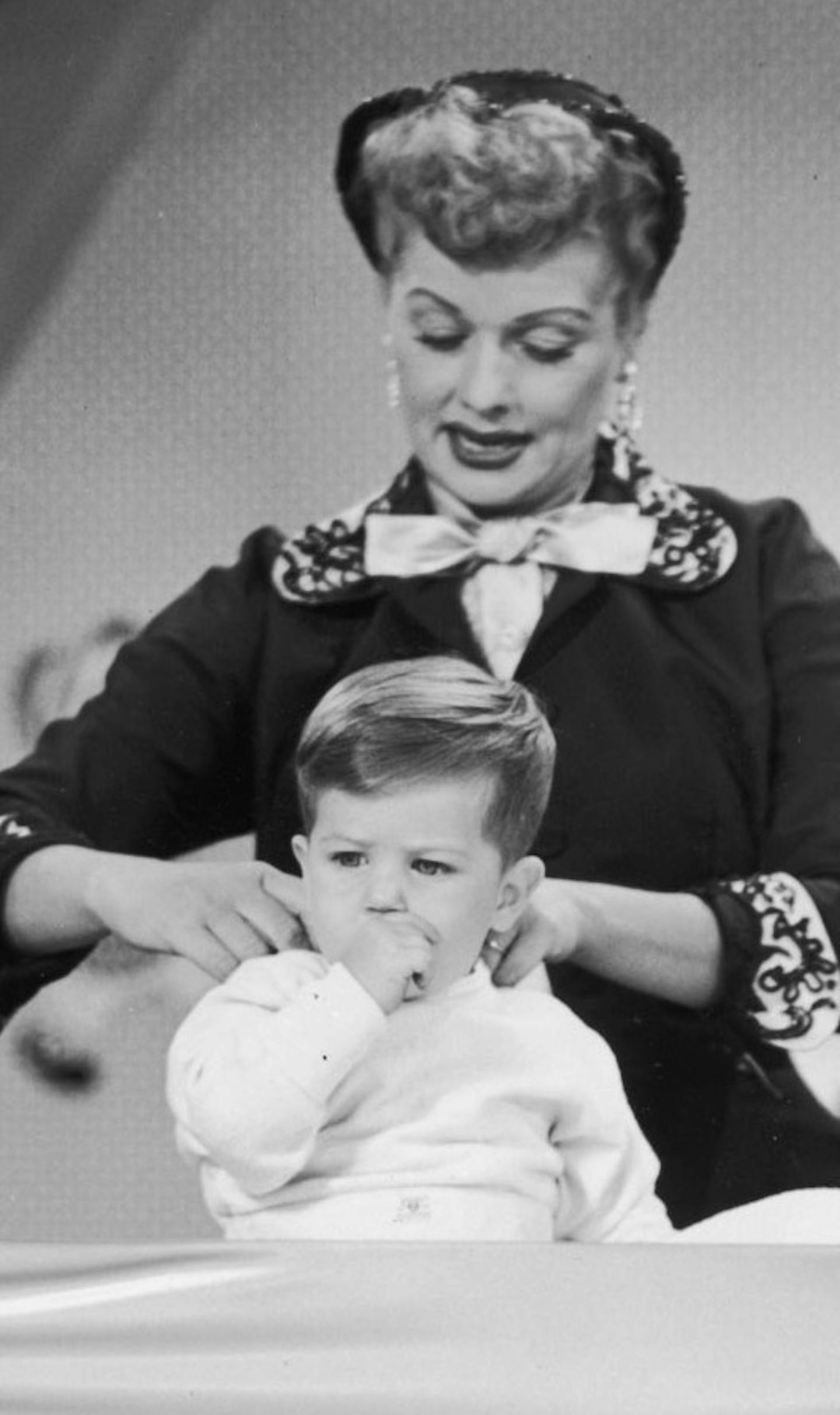 Lucille Ball and "Little Ricky" -- Desi Arnaz Jr. was born in January 1953 after an on-the-air pregnancy watched by millions of "I Love Lucy" television show fans. NOTE: At some point another child actor, Keith Thibodeaux, took over the role of Little Ricky. Not sure which is shown here with Lucy. File photo, Nov 1953.