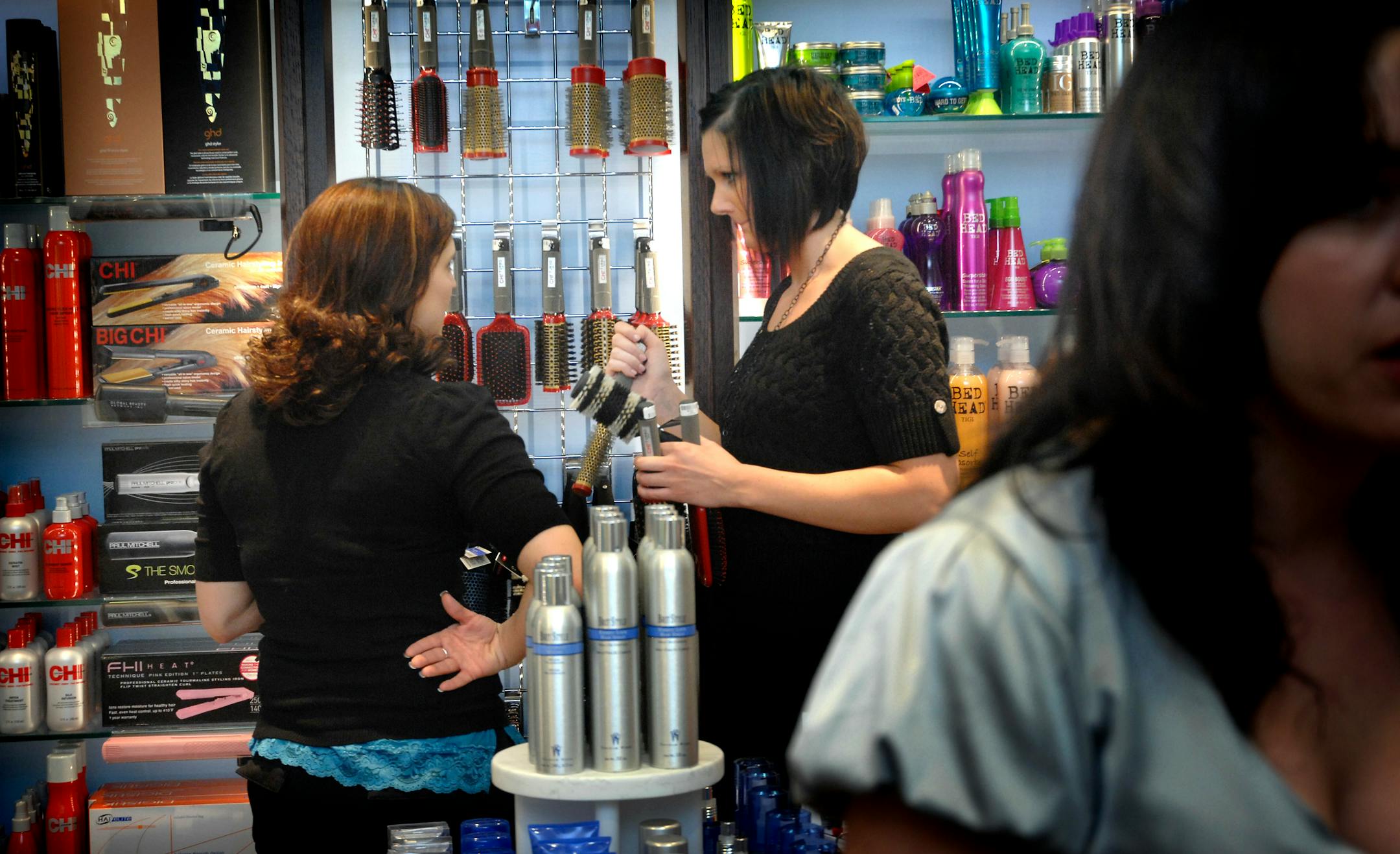 Stylists Kate Scheel, left, and Kate Suek on Tuesday discussed today's opening of the new PureBeauty store at the Mall of America. "What we really have to do is broaden our universe," CEO Paul Finkelstein said of Edina-based Regis Corp., which is expanding from hair salons into cosmetics, skin care and bath products.