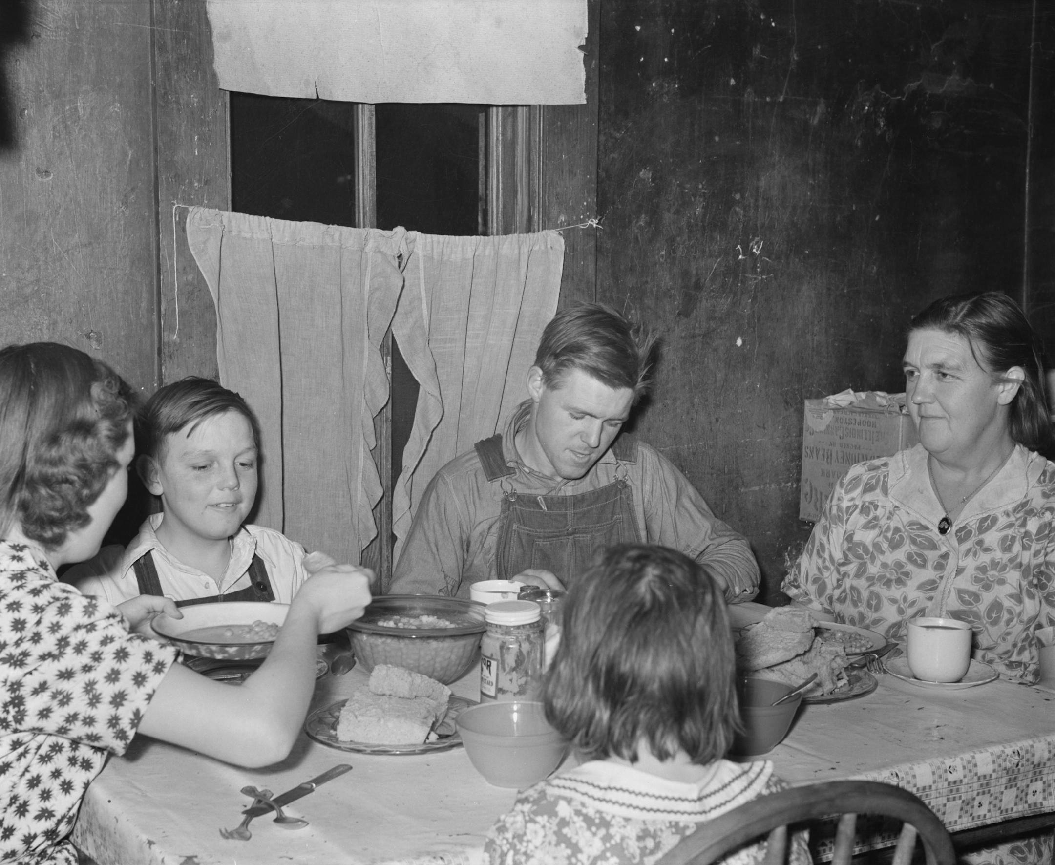 WPA (Works Progress Administration) worker and family at dinner. Zeigler, Illinois. Rothstein, Arthur, 1915-1985, photographer. Created / Published 1939 Jan. Farm Security Administration - Office of War Information Photograph Collection (Library of Congress). Library of Congress Prints and Photographs Division Washington, D.C. 20540 USA http://hdl.loc.gov/loc.pnp/pp.print.