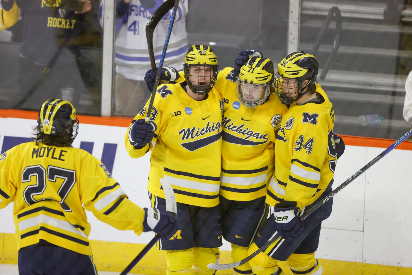 Michigan players celebrate a goal against Colgate during an NCAA hockey game on Friday, March 24, 2023 Allentown, Penn. (AP Photo/Jason E. Miczek)