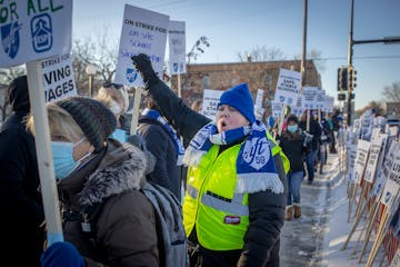 Kelly Metzler, a teacher at Wilder, joined around 200 Minneapolis teachers and supporters picketing near their school during the strike.