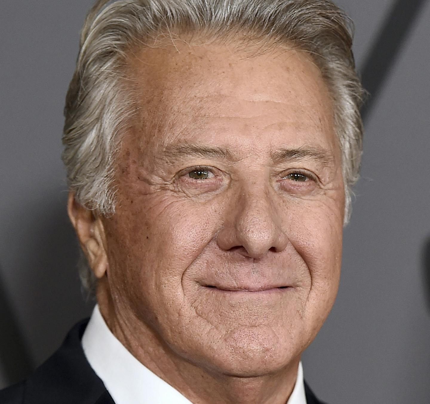 FILE - In this Nov. 11, 2017 file photo, Dustin Hoffman arrives at the 9th annual Governors Awards in Los Angeles. Hoffman was accused by a woman of sexual harassing when she was 17. He has apologized for his behavior. (Photo by Jordan Strauss/Invision/AP, File)