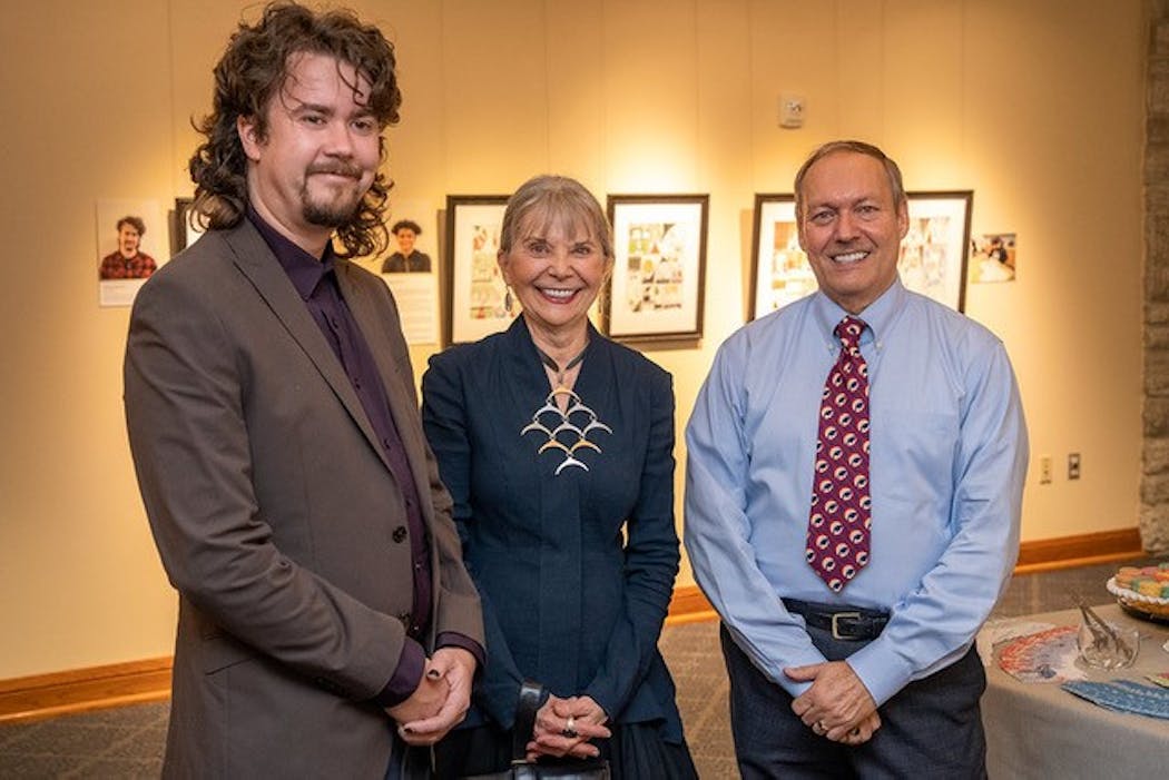 Felt artist Susan J Sperl stands with Jack Kotz (left), who taught a youth art class organized by the Mississippi Watershed Management Organization, and Westminster Gallery Director Rodney Allen Schwartz, at the “Voices from the Water” exhibit.