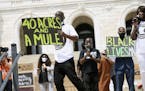People demonstrate at the Minnesota Capitol on June 19 to mark Juneteenth. Juneteenth marks the day in 1865 when federal troops arrived in Galveston, 