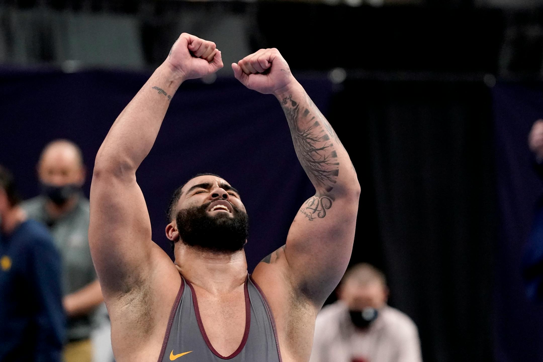 Minnesota's Gable Steveson celebrates after defeating Michigan's Mason Parris during their 285-pound match in the finals of the NCAA wrestling championships Saturday, March 20, 2021, in St. Louis. (AP Photo/Jeff Roberson)