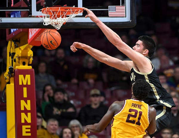 Purdue center Zach Edey dunked against the Gophers at Williams Arena on Jan. 19, 2023.