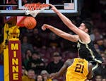 Purdue center Zach Edey dunked against the Gophers at Williams Arena on Jan. 19, 2023.