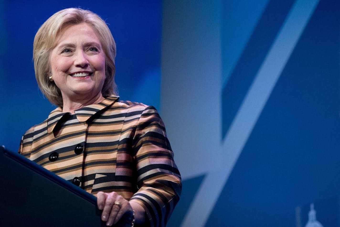 Democratic presidential candidate Hillary Clinton pauses while speaking at the Congressional Hispanic Caucus Institute's 39th Annual Gala Dinner at the Washington Convention Center, in Washington, Thursday, Sept. 15, 2016. Clinton returned to the campaign trail after a bout of pneumonia that sidelined her for three days and revived questions about both Donald Trump's and her openness regarding their health.